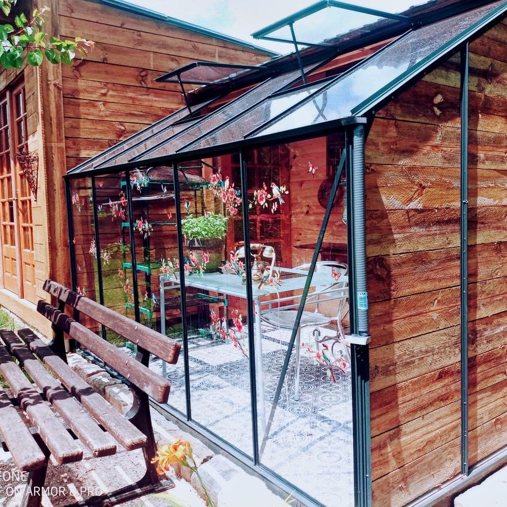 Véranda moderne en polycarbonate 4mm avec vue jardin