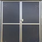 Portes de garage sur mesure en aluminium et PVC